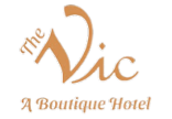 The Vic A Boutique Hotel logo in gold
