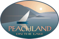 City of Peachland logo inside oval with scenery of yacht on calm ocean waters with mountains and sunset in background with text on the lake inside