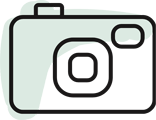 Icon of camera with light green accents and dark black outline of camera shape