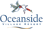 Oceanside Village Resort logo in blue with image of hummingbird drinking nectar from flower